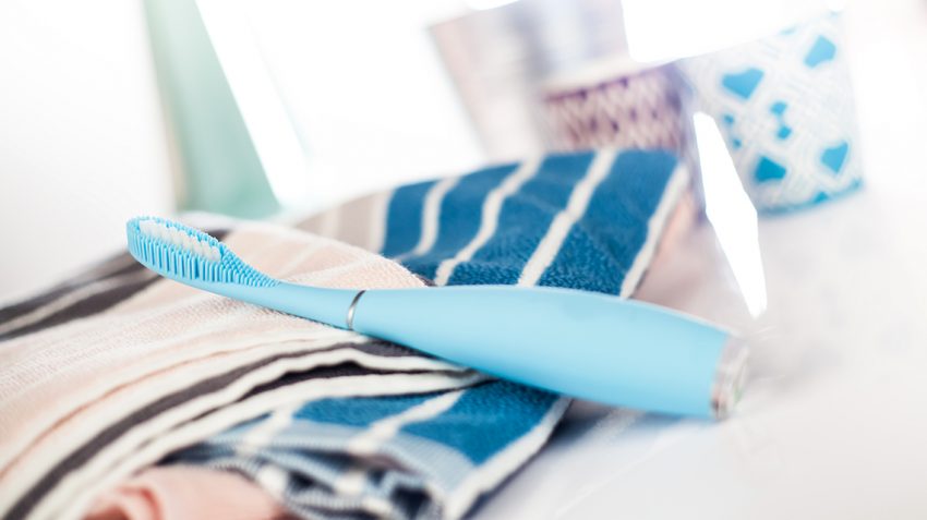 FOREO ISSA2 toothbrush on towel in batroom