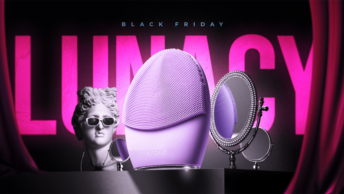 FOREO LUNA 4 device in lavender color in an abstract space in front of an inscription that says LUNACY in pink color, a statue's head with sunglasses on and two mirrors