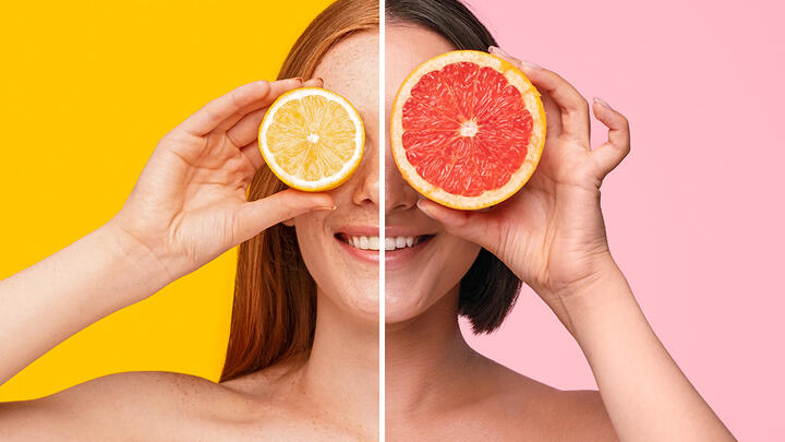 A split image of two women with different hair color and lengths each holding a sliced citrus fruit